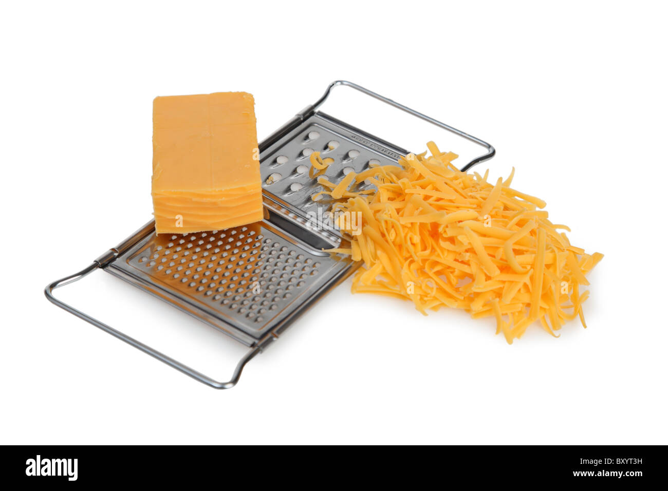 Cheese grater and cheese on white background Stock Photo