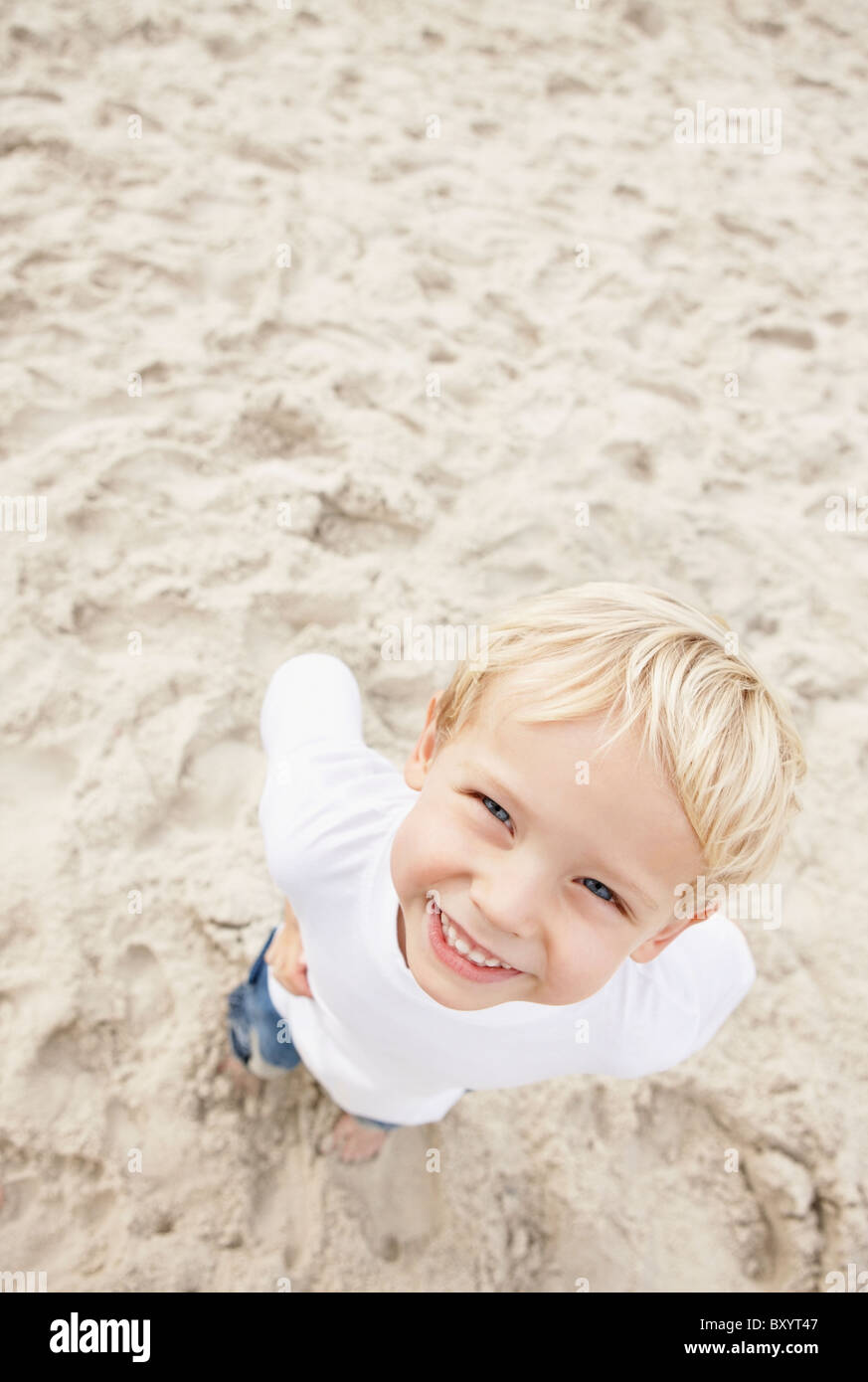 Boy looking at camera and smiling Stock Photo - Alamy