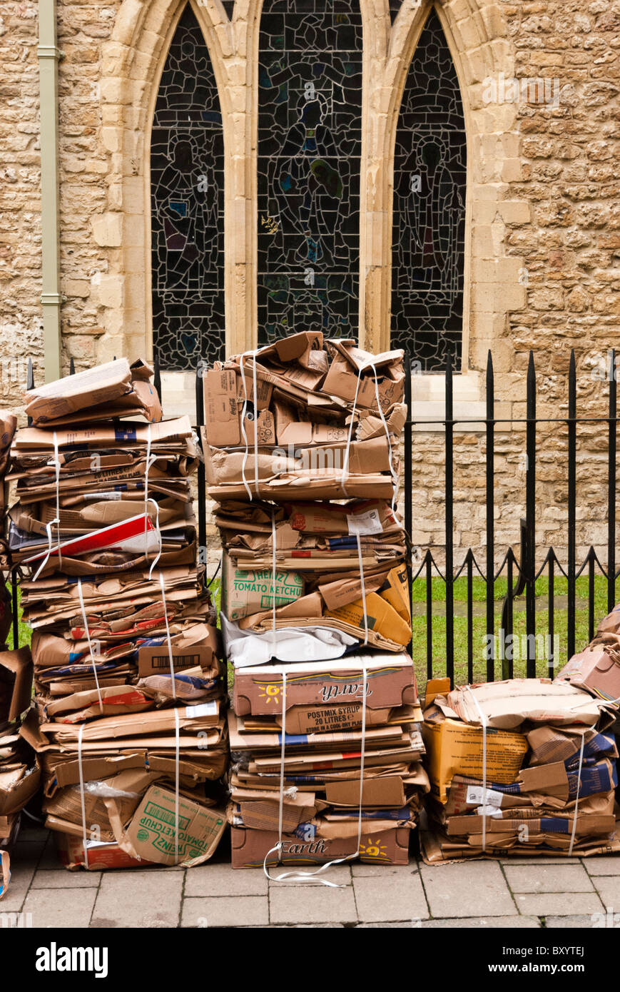 Cardboard baled up and let out for collection for recycling in Ship Street, Oxford, Oxfordshire Stock Photo