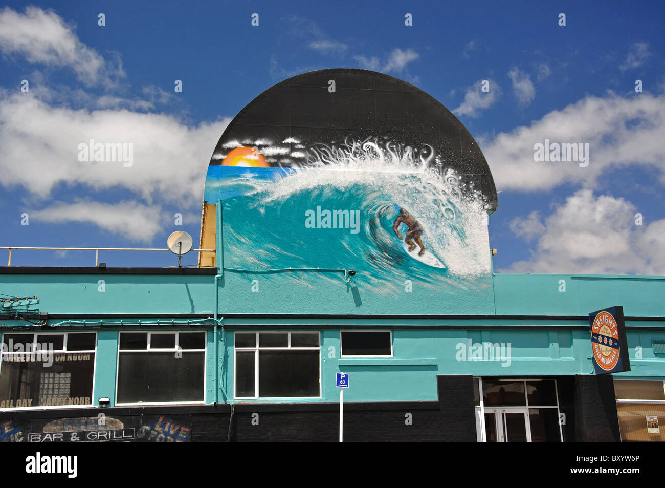 Surfing mural on beachfront bar, New Brighton, Christchurch, Canterbury, South Island, New Zealand Stock Photo