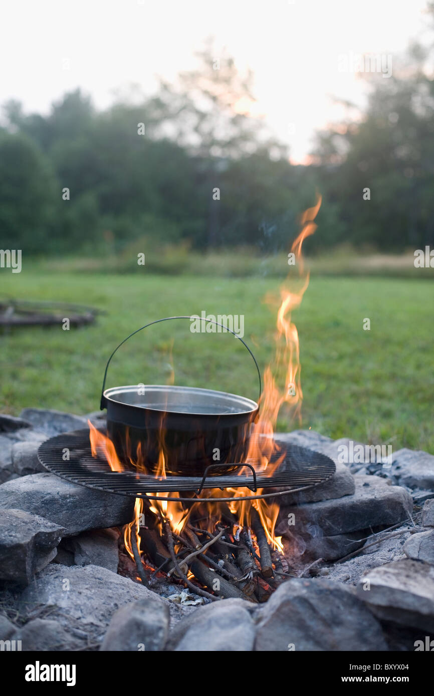 Boiling Water On Campfire Stock Photos & Boiling Water On Campfire