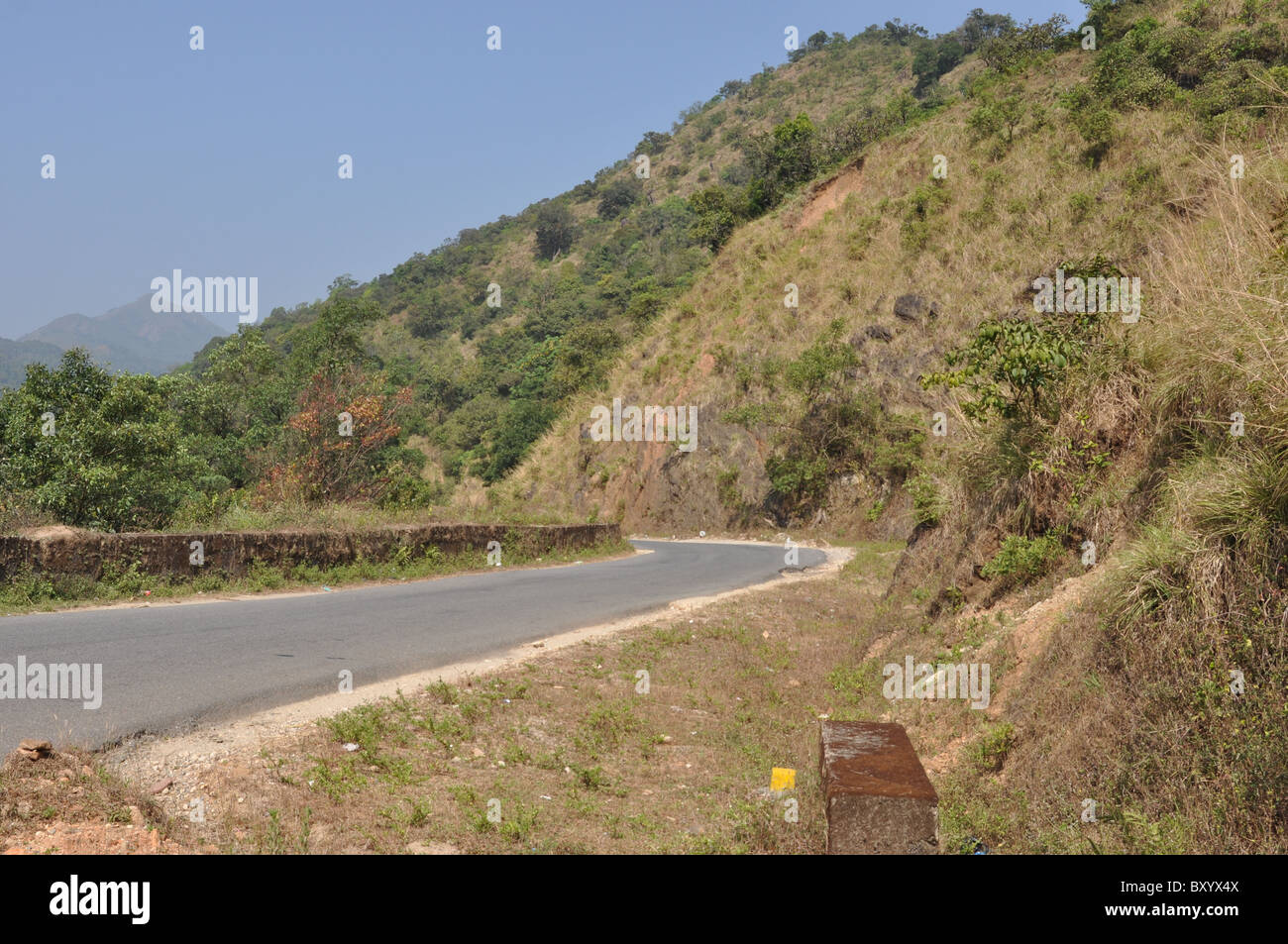A road cut into the hill side Stock Photo