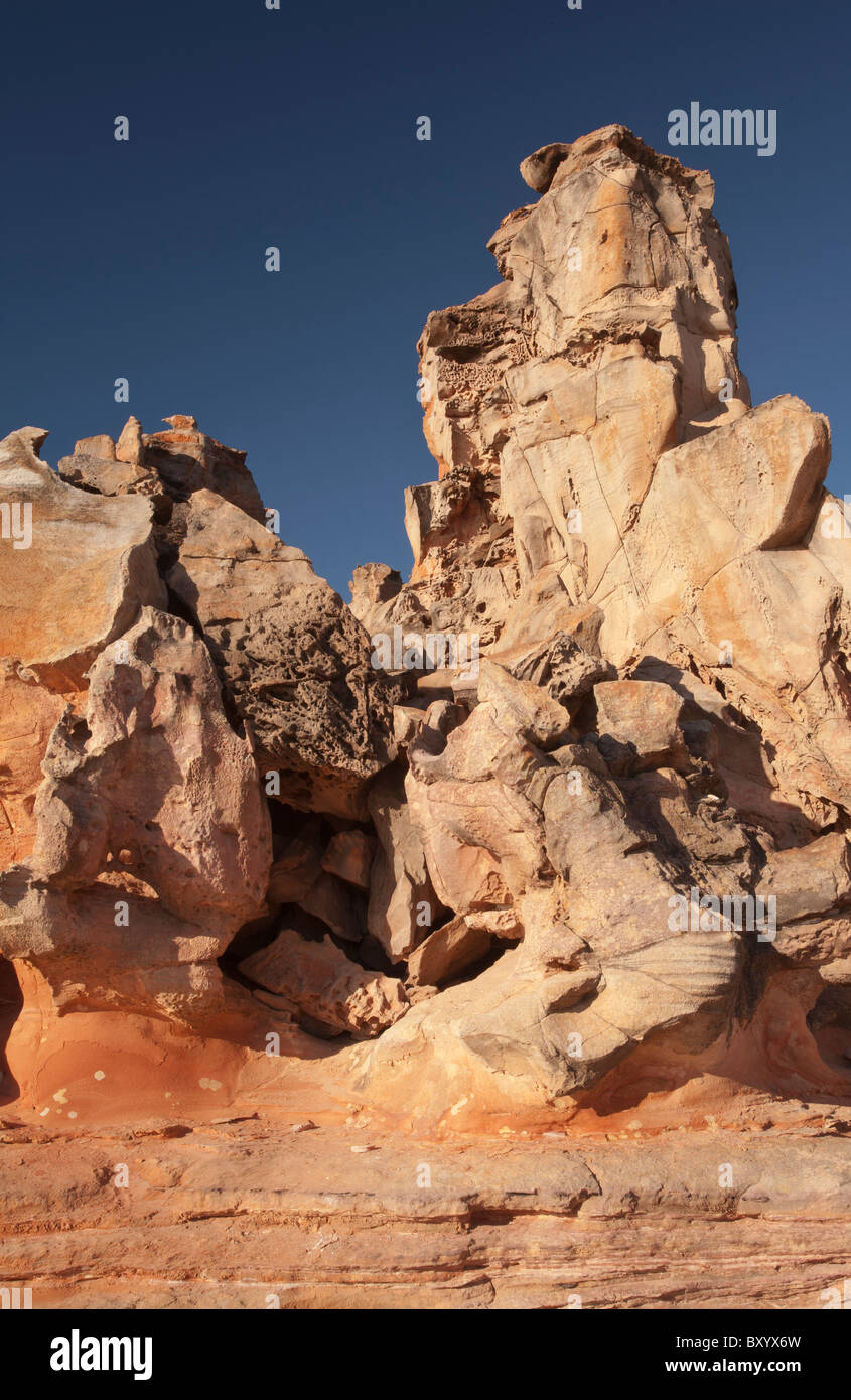 Grotesquely shaped rocks at Barn Hill Station beach, Broome, Kimberley, Western Australia Stock Photo