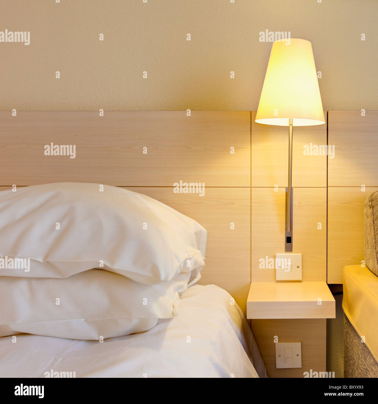 lamp beside bed