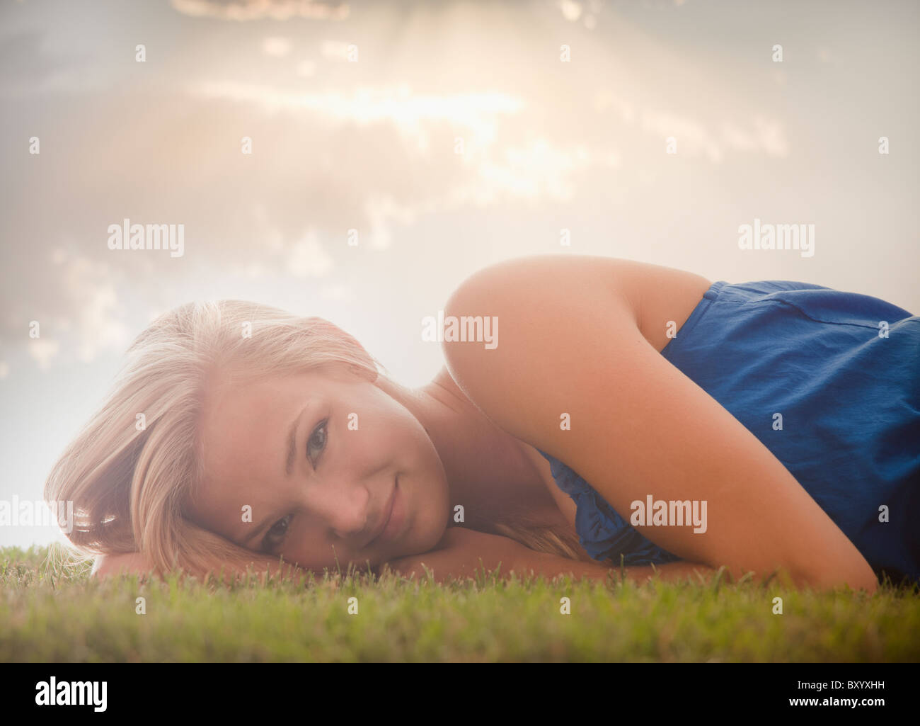 Young girl lying on grass Stock Photo