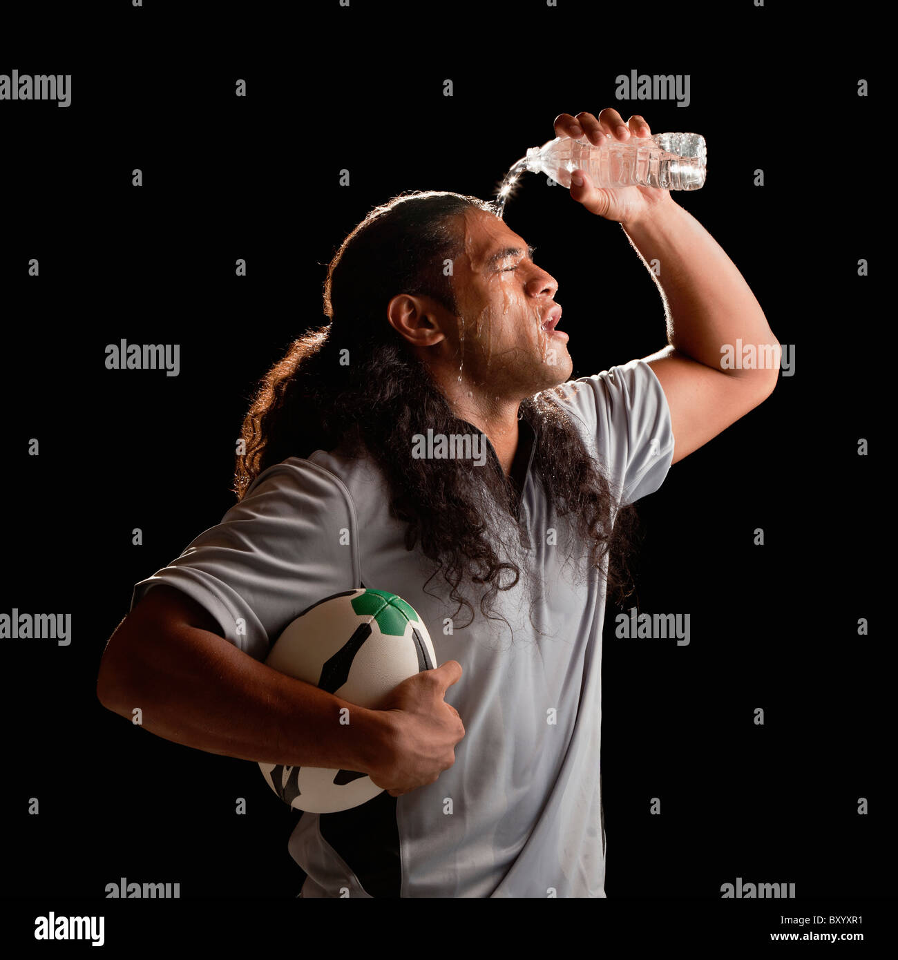 Man pouring water over head hires stock photography and images Alamy