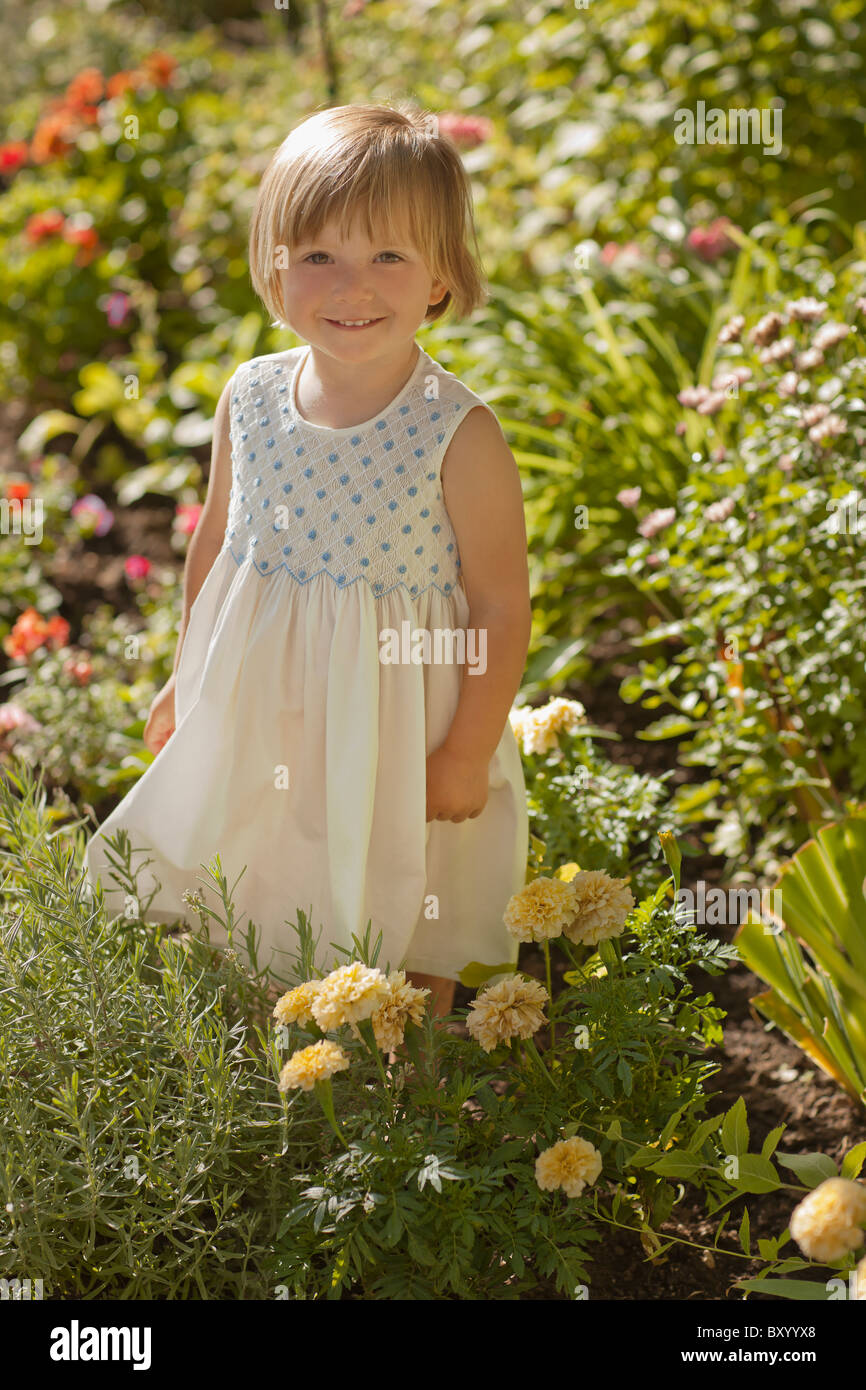 Portrait of girl in garden Stock Photo - Alamy