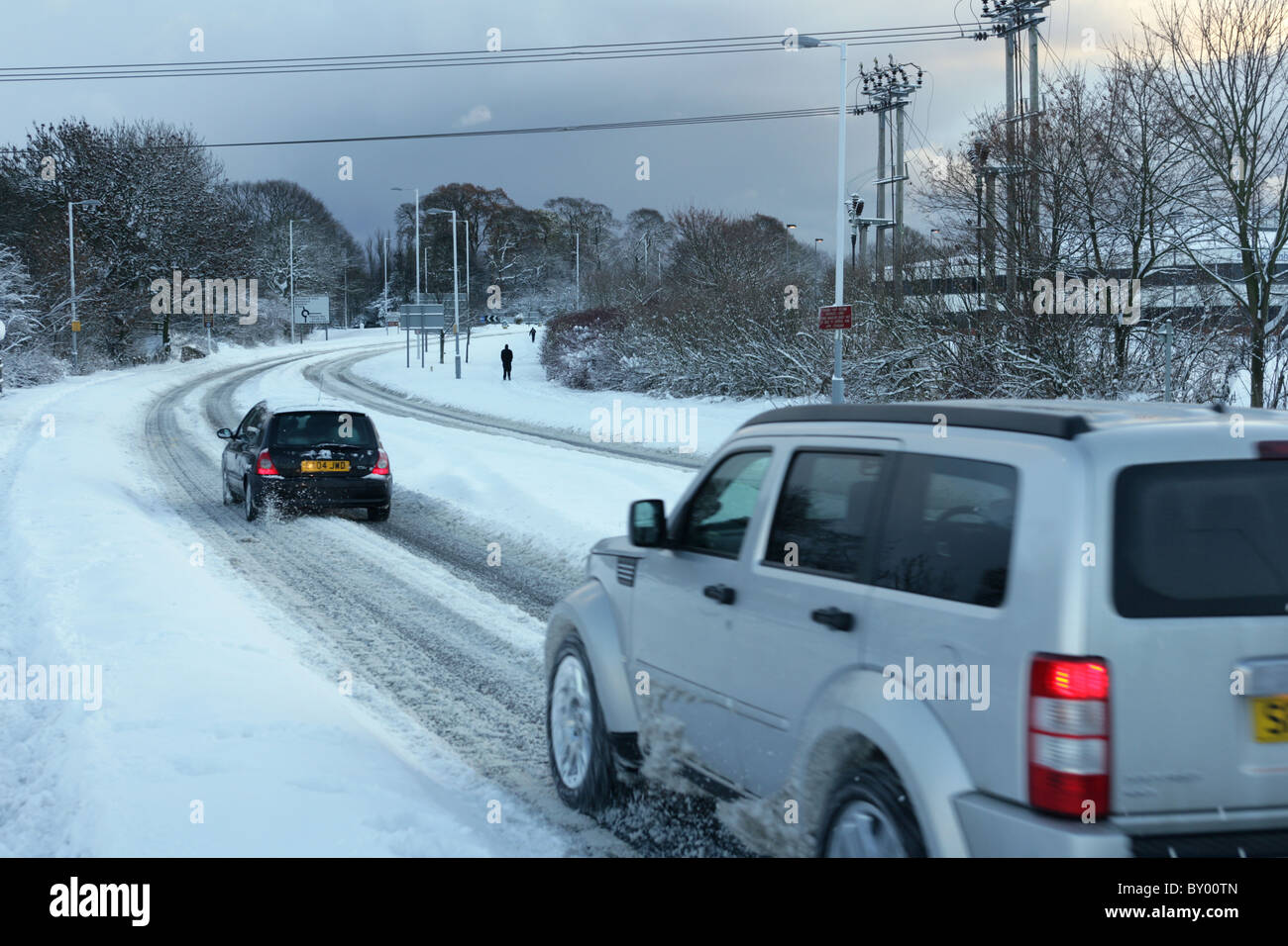 Cars travelling in snow. Fife Scotland Stock Photo