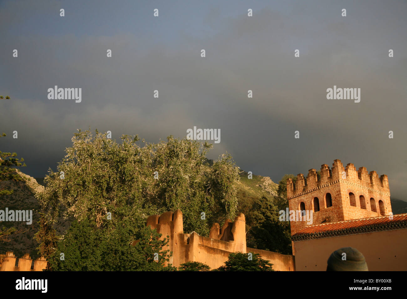 local people walk around the bright streets of chefchaouen the bright morocco village in the riff mountains Stock Photo