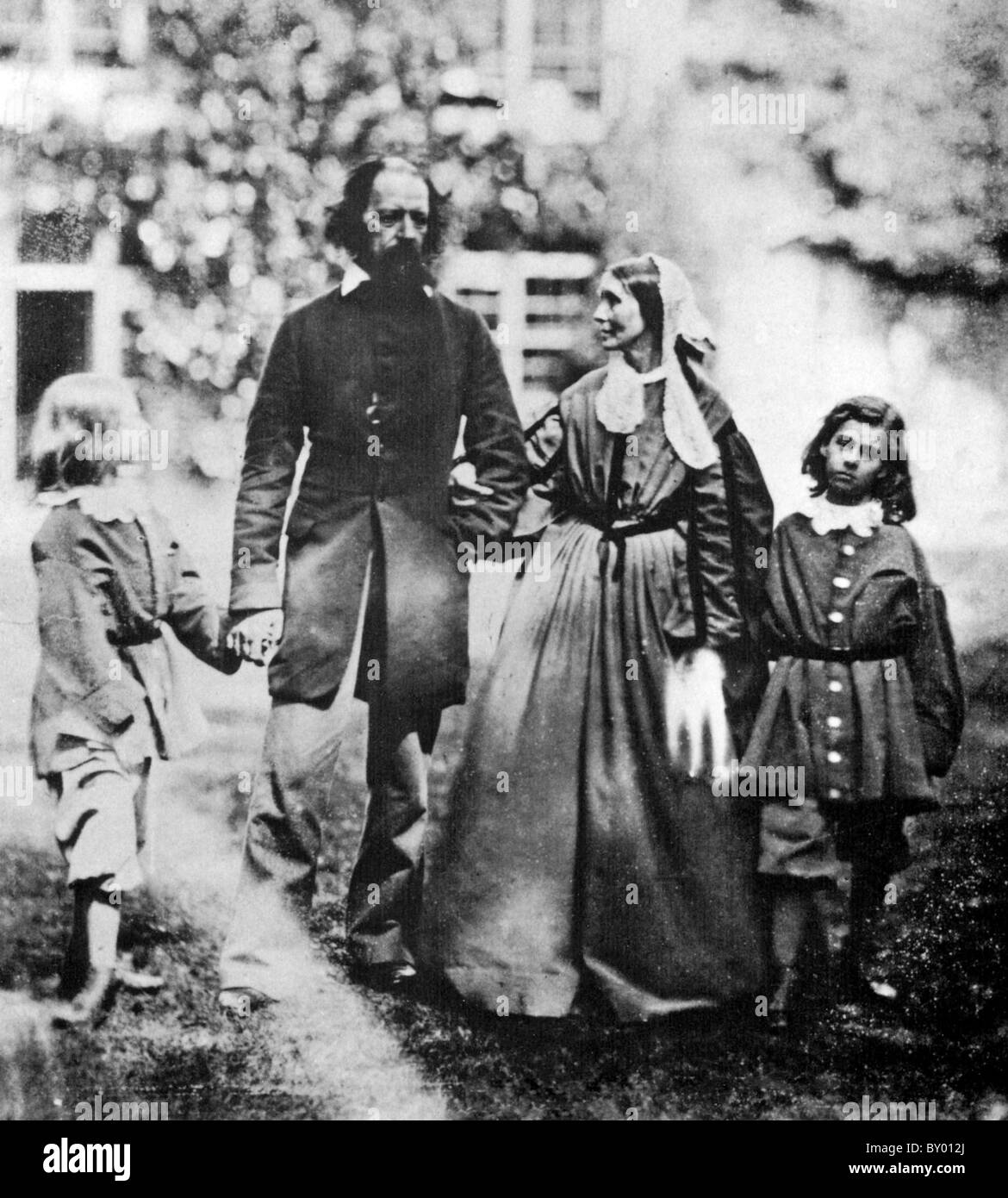 ALFRED LORD TENNYSON (1809-1892) English poet with his wife Emily Sellwood and sons Hallam (left) and Lionel Stock Photo