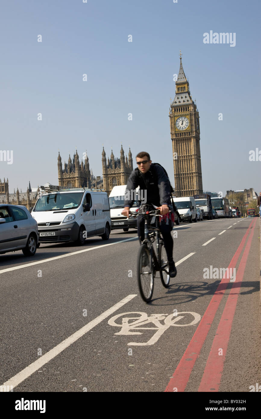 Cycle lane on Westminster Bridge with the Houses of Parliament in the background Stock Photo