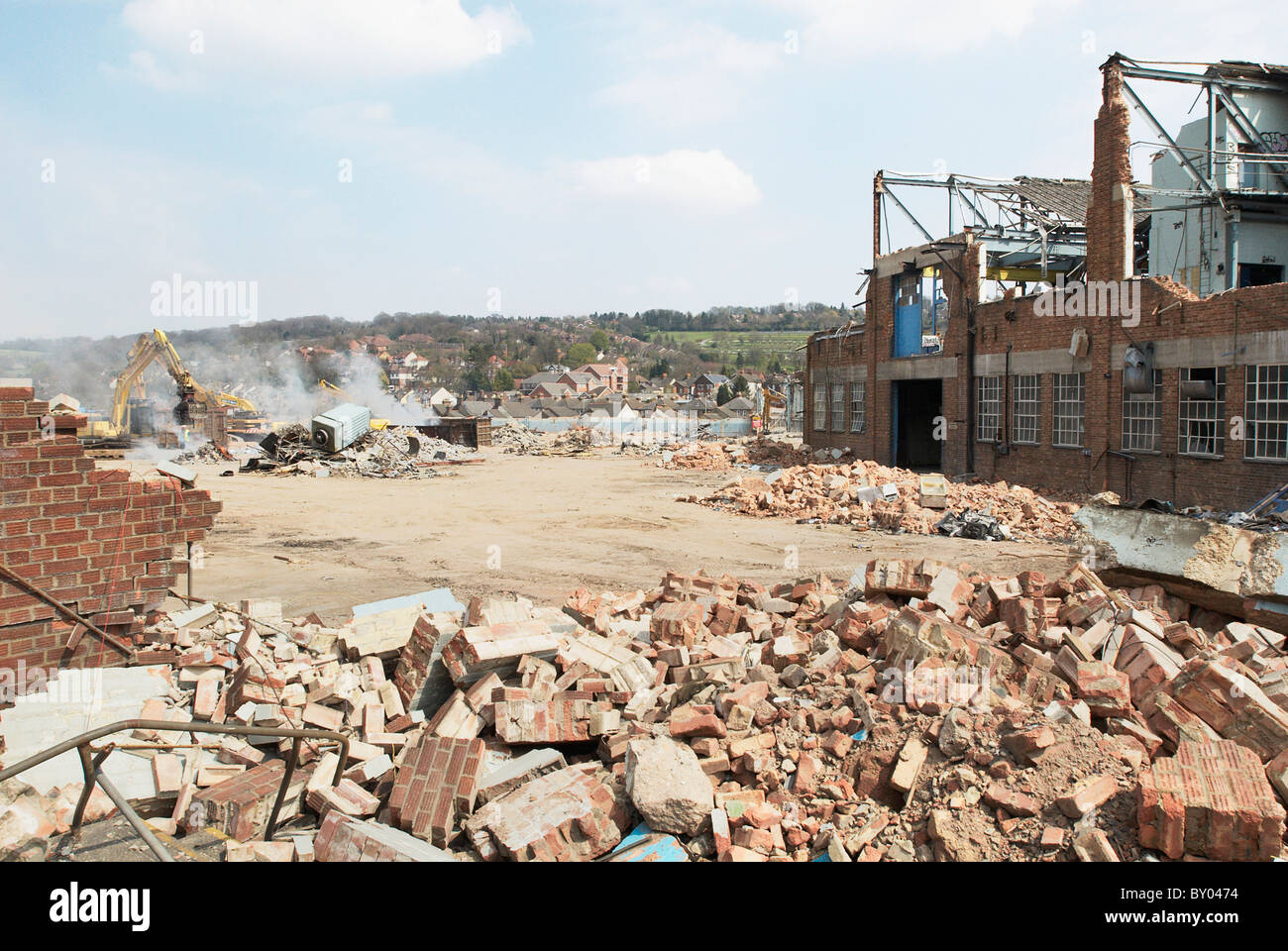 Demolition of a factory and clearing a plot of disused land High Wycombe UK Stock Photo