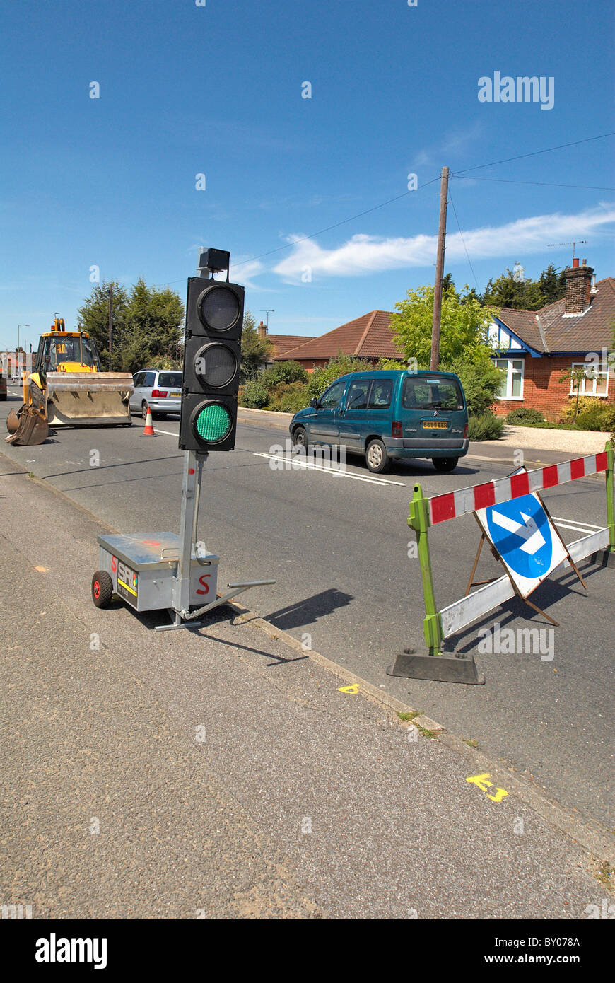 Temporary traffic lights showing green UK Stock Photo Alamy