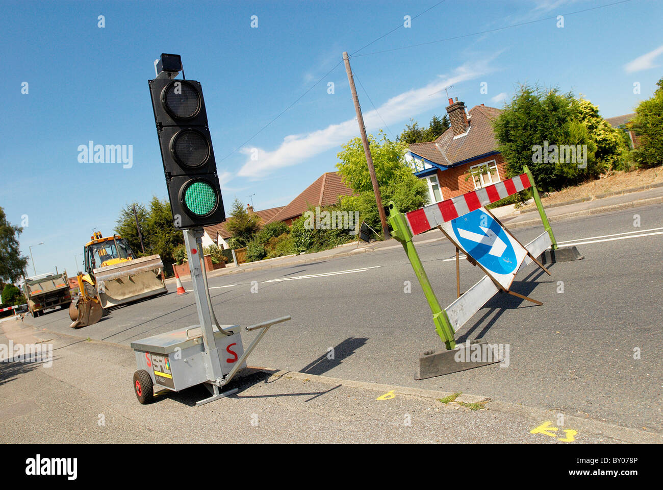 Temporary traffic lights showing green UK Stock Photo - Alamy