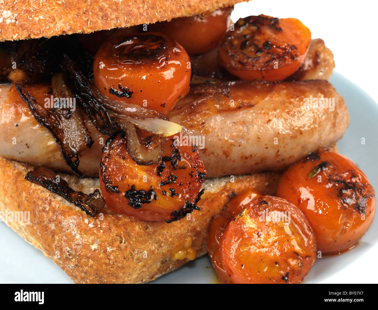 Freshly Cooked Pork Sausage Sandwich With Cherry Tomatoes And