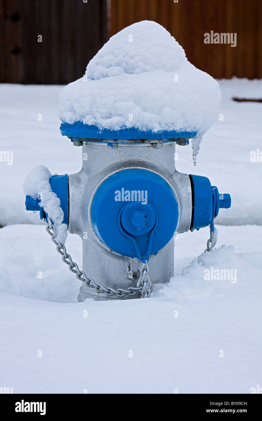 Fire Hydrant In Snow Stock Photo