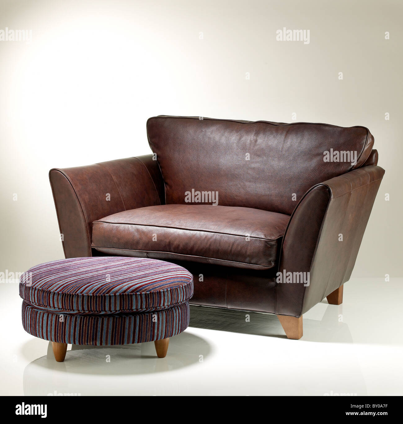 Comfortable Large Brown Leather Chair With Footstool Stock Photo Alamy