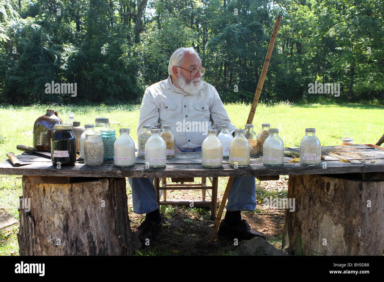 A CivIl War reenactor shows his wares and explains history to passersby in Albemarle County, Virginia. Stock Photo