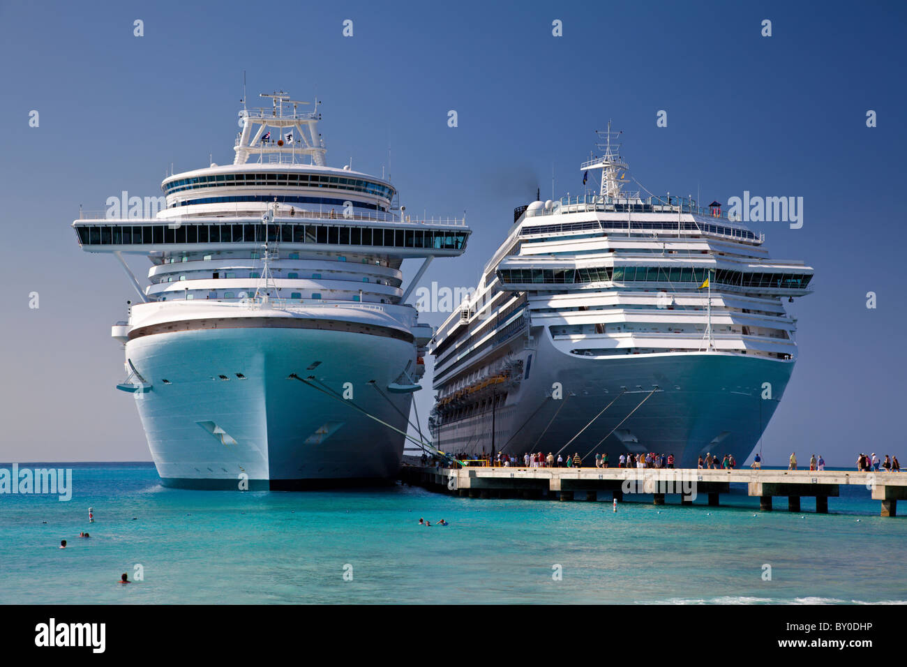 Two Cruise Ships Docked in Grand Turk Island Stock Photo