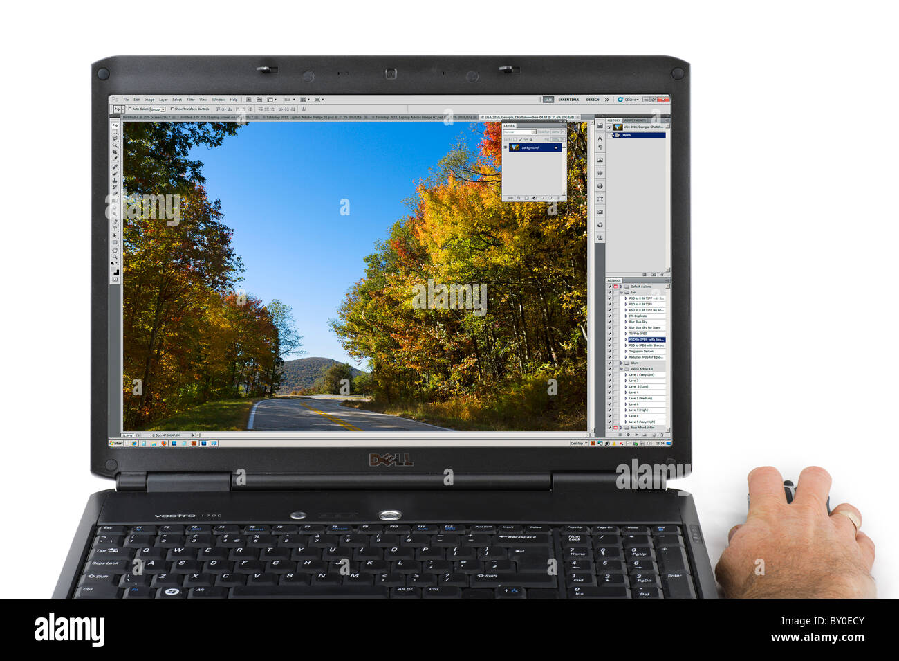Using Adobe Photoshop CS5 on a Laptop Computer, UK Stock Photo