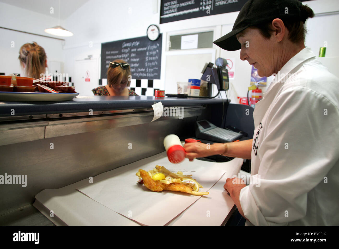 Fish and Chips being served in The Smokehouse, Mapua, Nelson, New Zealand Stock Photo