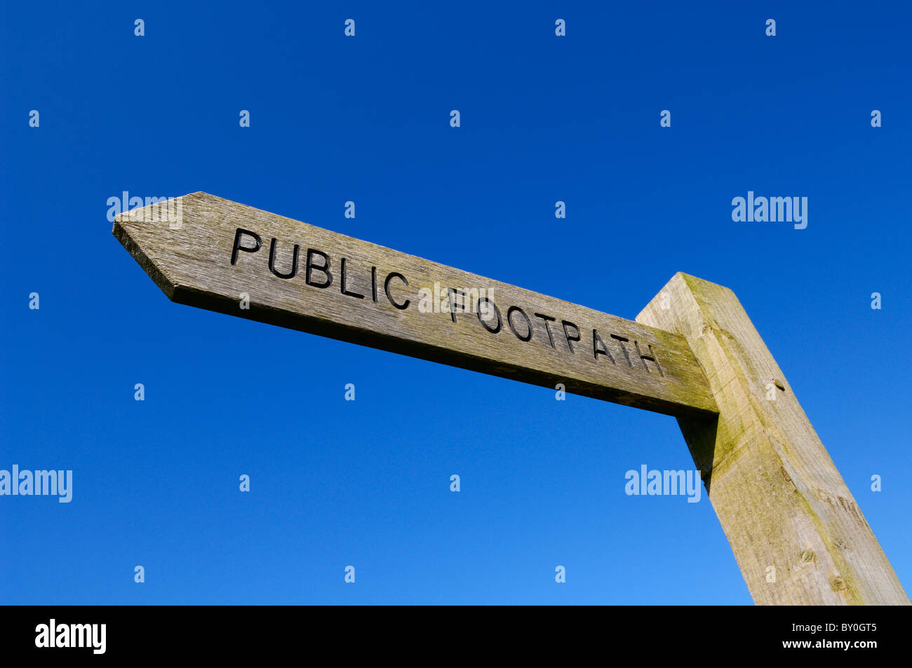 Public Footpath sign under a clear blue sky at Woolacombe, Devon, England. Stock Photo