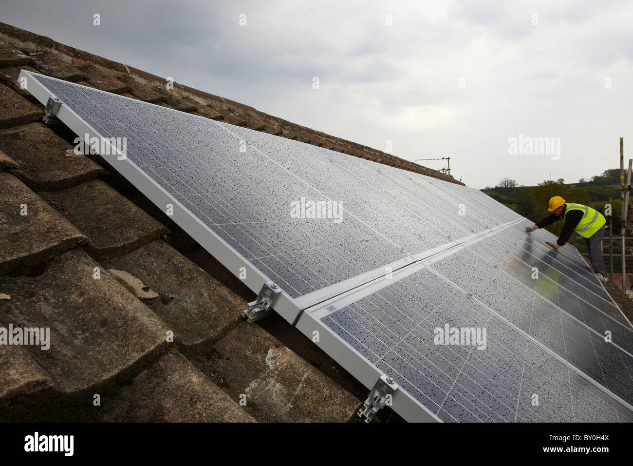 Solar Photovoltaics installation on roof Stock Photo