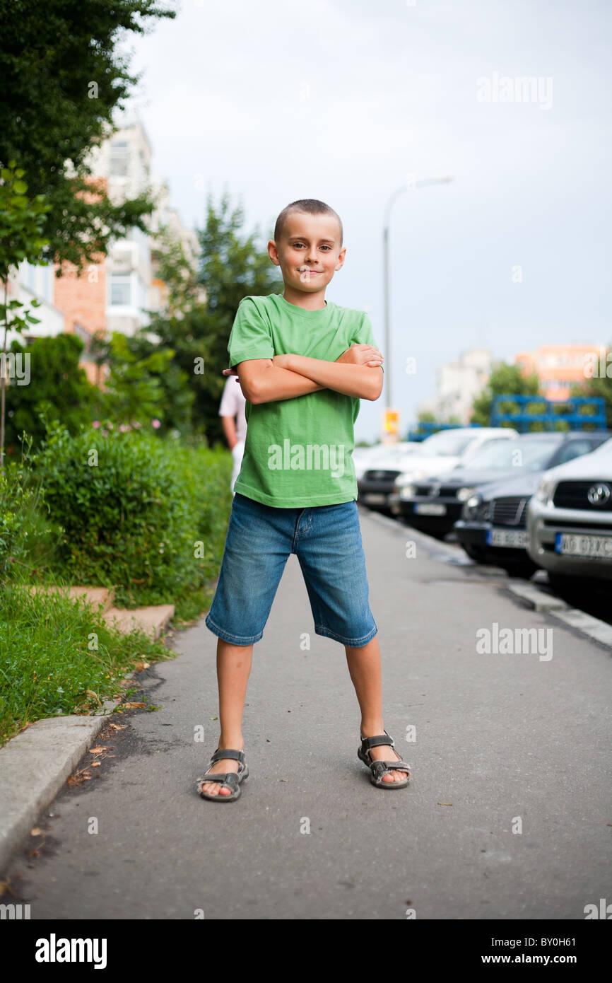 Portrait of a beautiful little boy in an urban environment Stock Photo ...