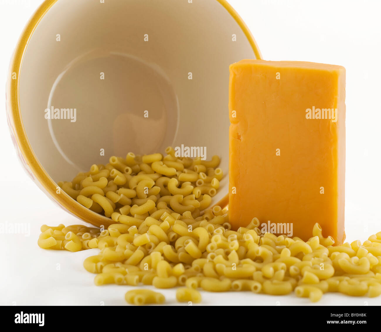 Uncooked mac n' cheese with bowl Stock Photo Alamy