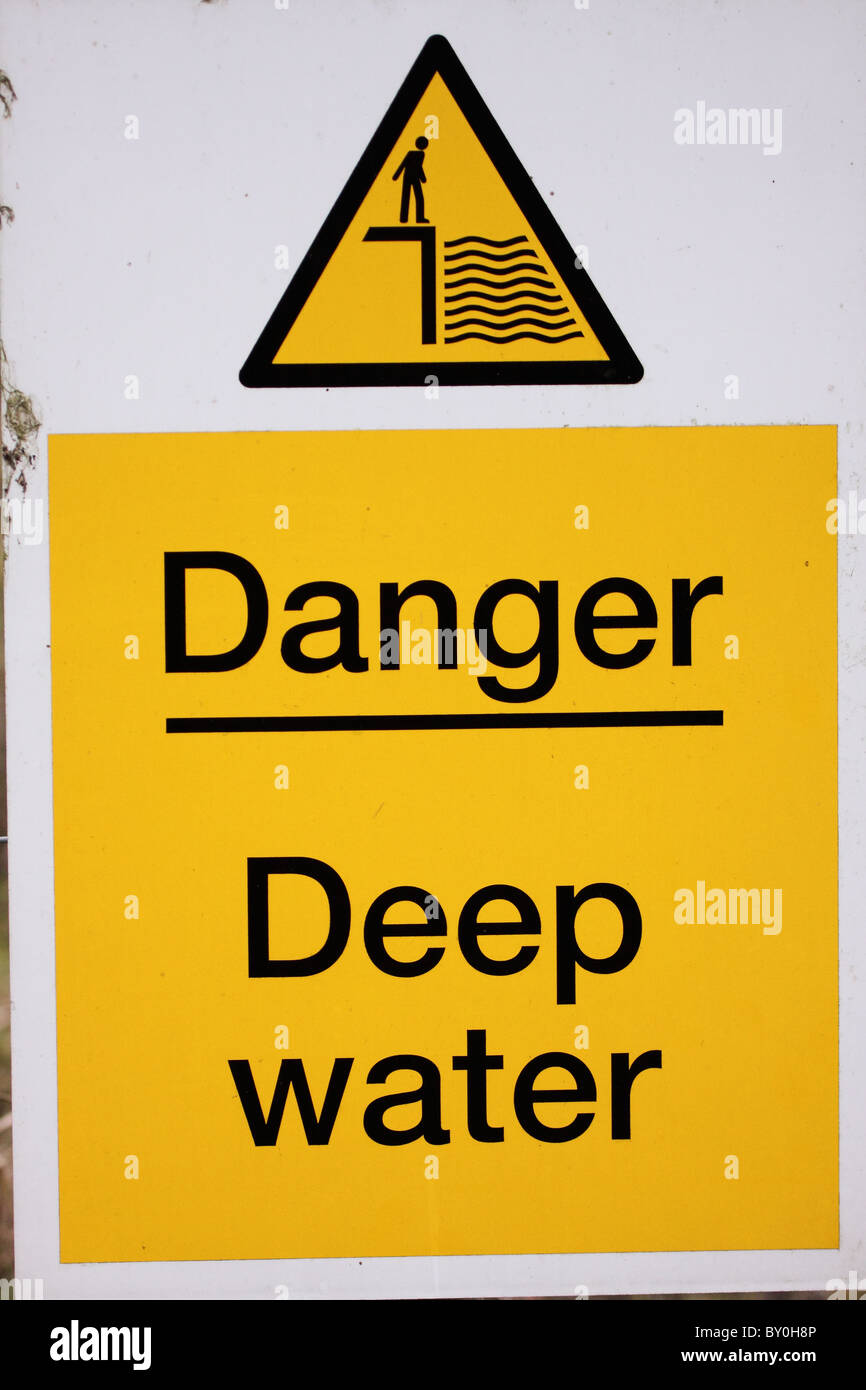 danger deep water sign black yellow image stop keep out beware caution warning Stock Photo