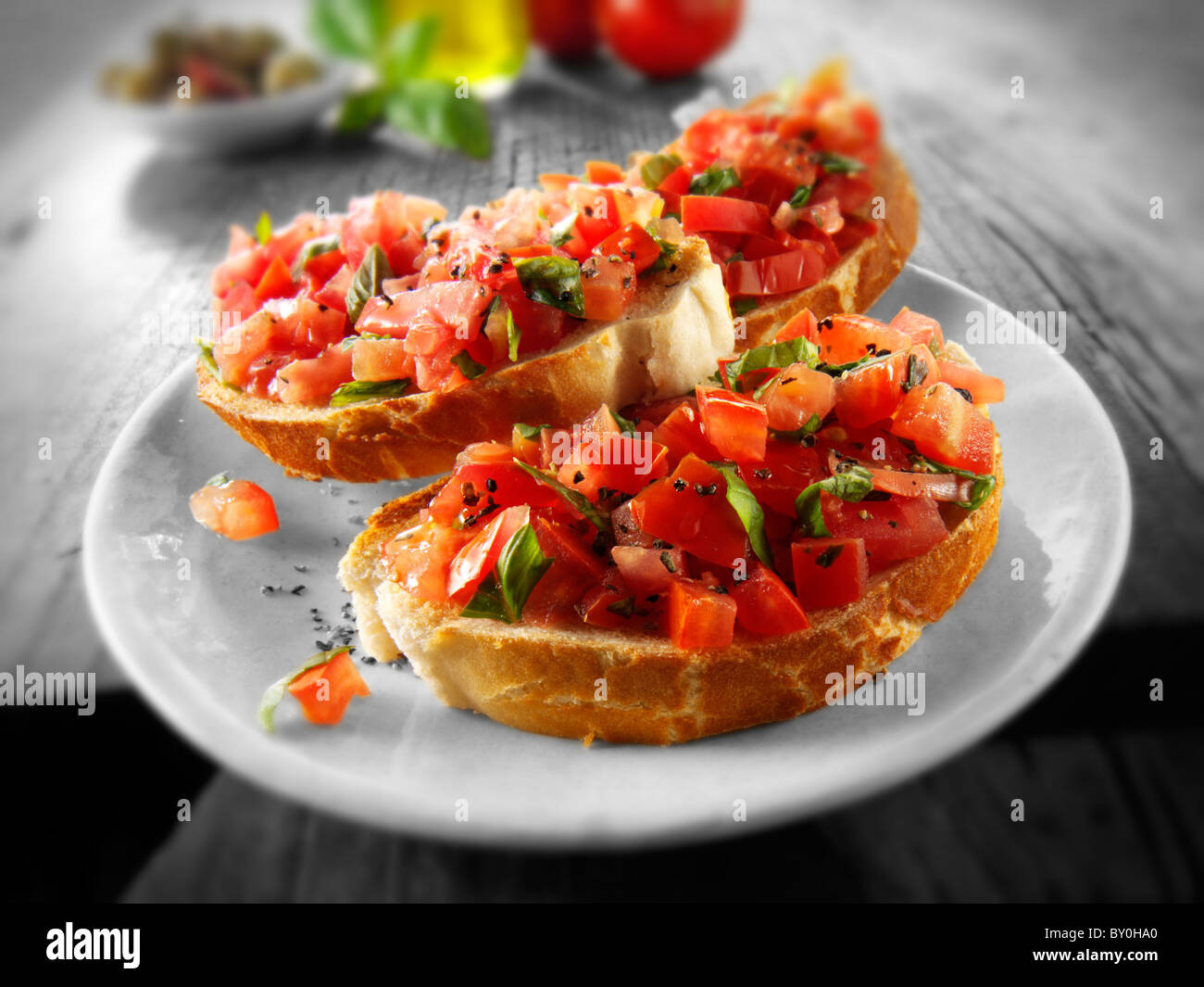 Fresh chopped beefsteak tomato bruschettas Stock Photo