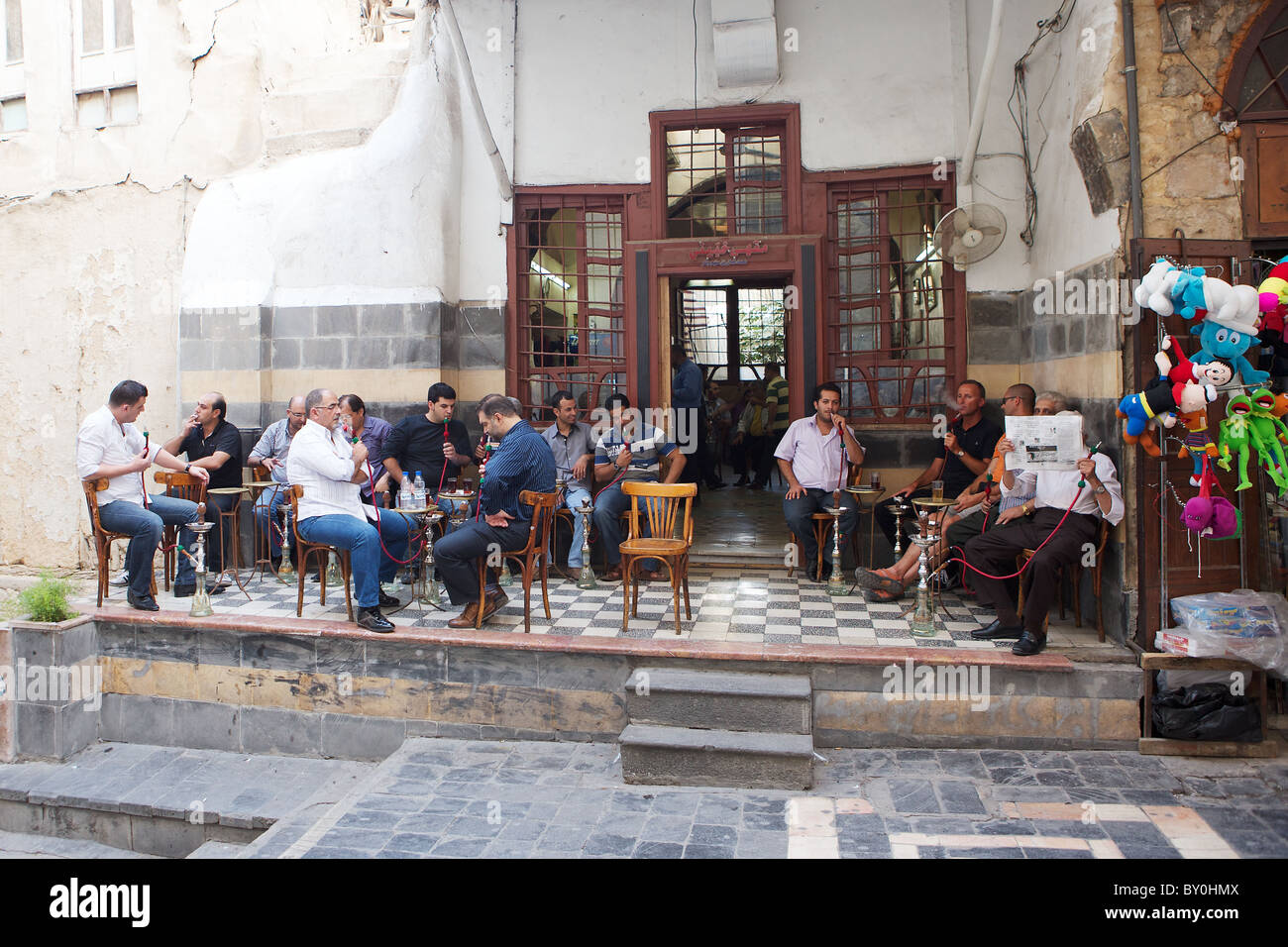 Syrian men smoking shisha pipes in Old City, Damascus, Syria Stock Photo