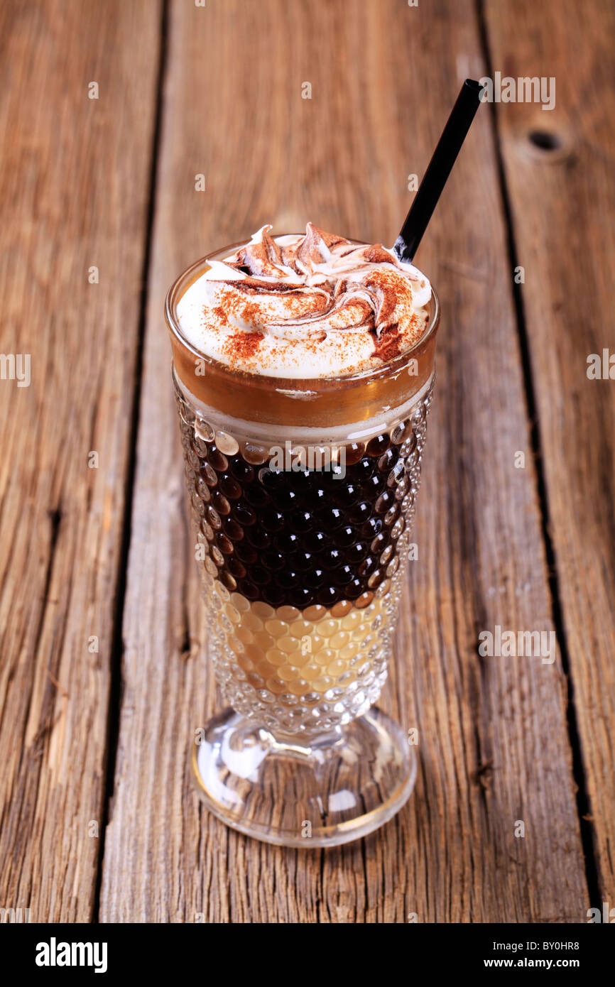 Coffee drink topped with whipped cream Stock Photo