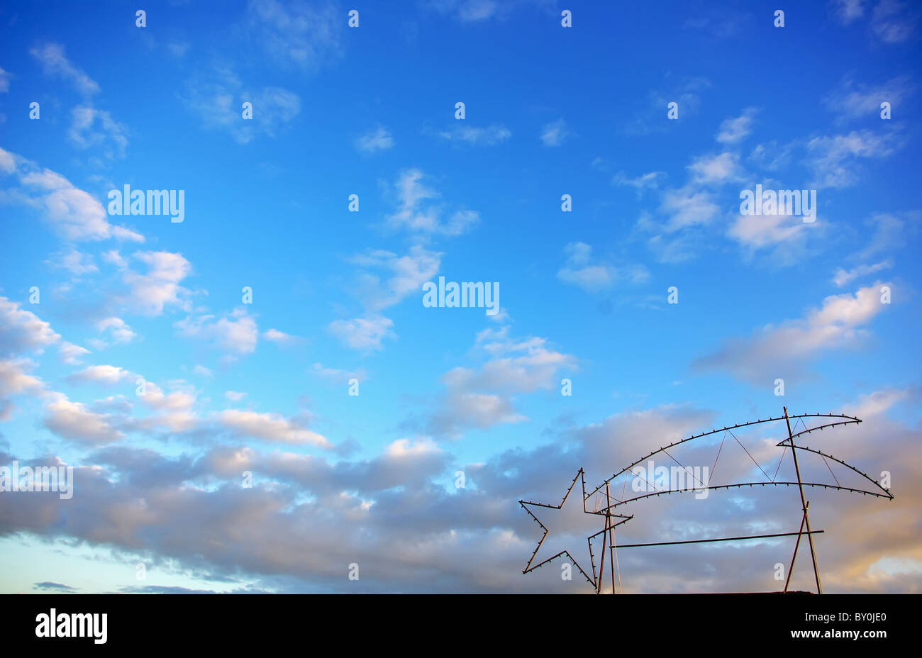Christmas star in blue sky Stock Photo Alamy