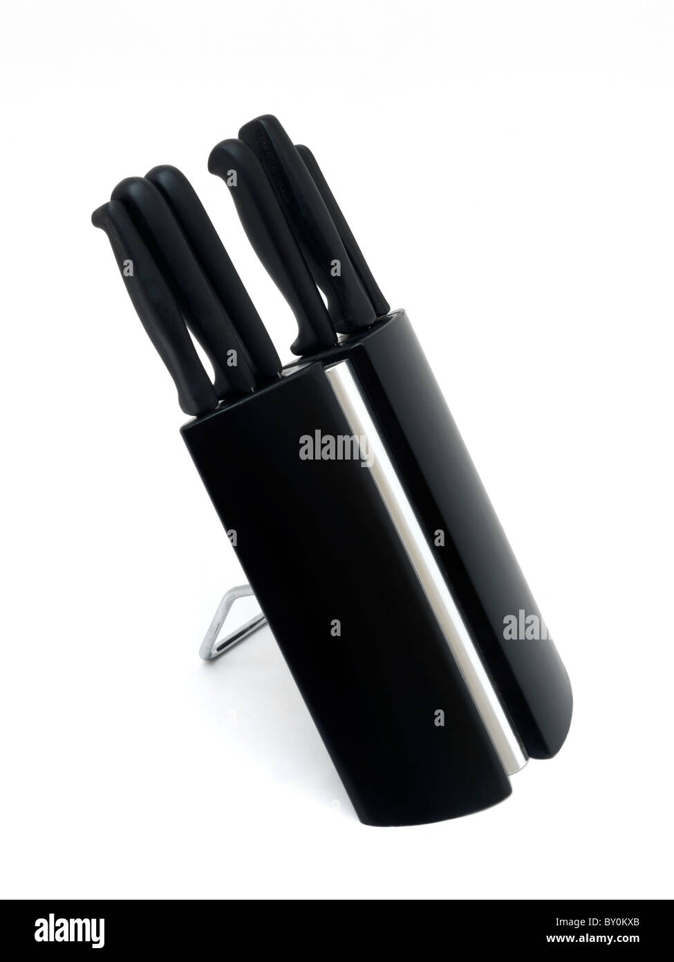 A Set Of Knives In a Knife Rack Stock Photo