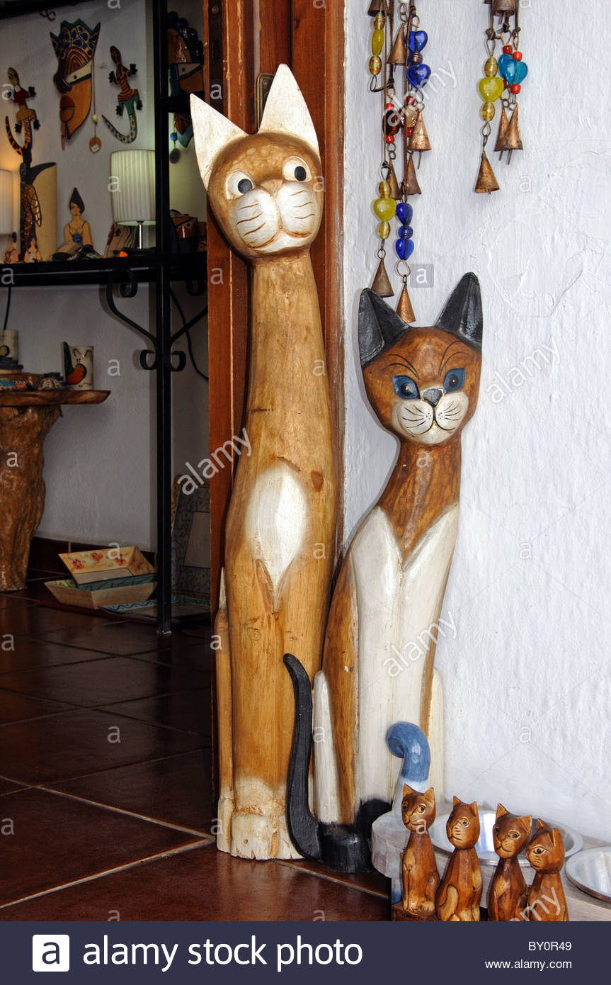 tall wooden cats