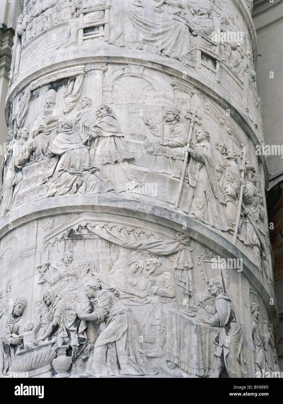 Karlskirche. Column on the left side of the church depicting scenes from the life of St. Charles Borromeo. Vienna. Austria. Stock Photo