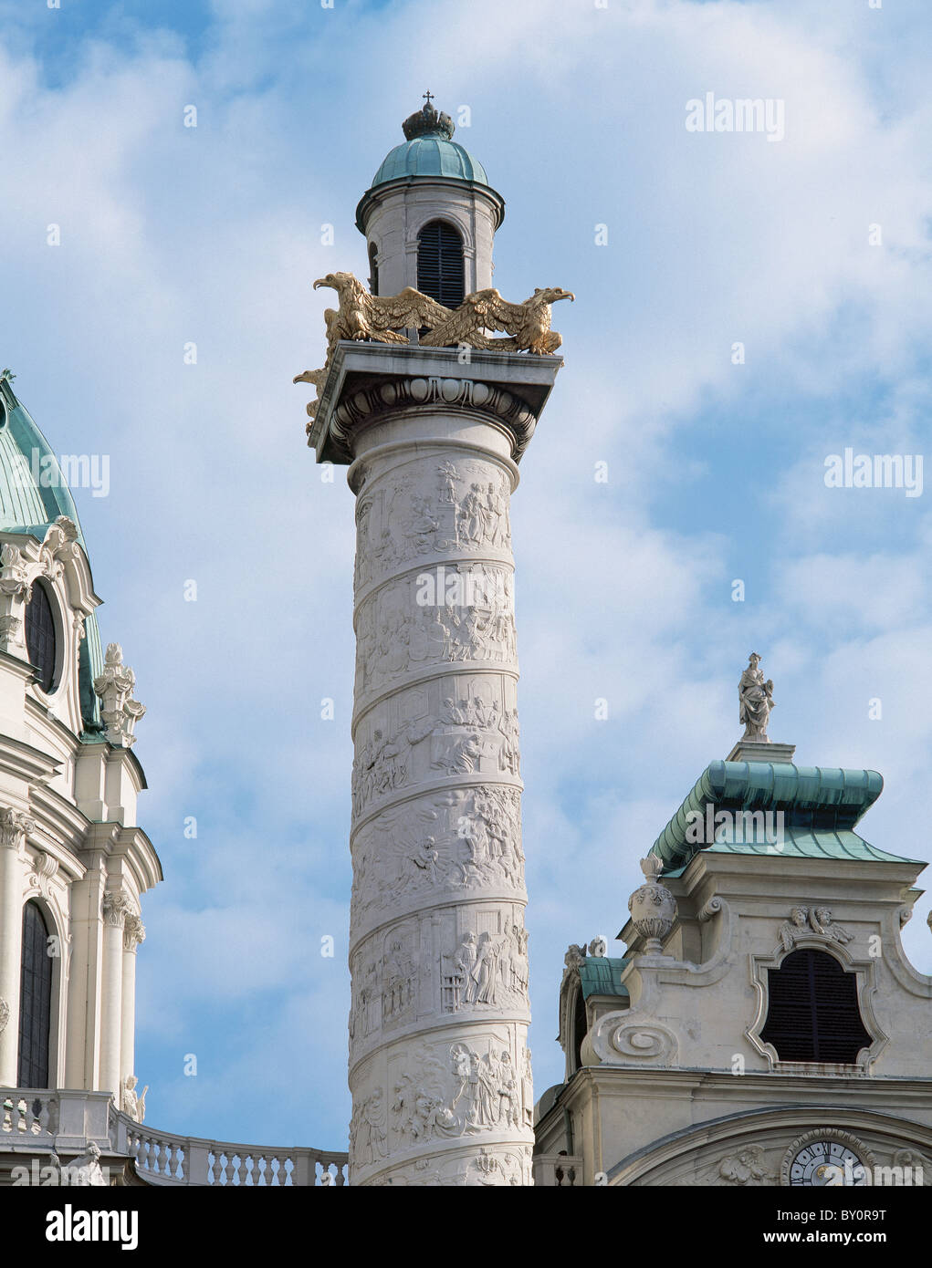 Karlskirche. Column on the right side of the church depicting scenes from the life of St. Charles Borromeo. Vienna. Austria. Stock Photo