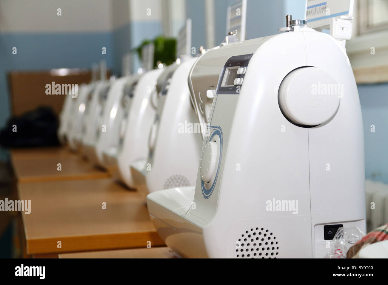 sewing classroom with sewing machines in china Stock Photo Alamy
