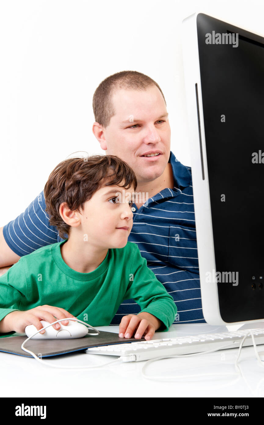 father and children with desktop computer isolated on white Stock Photo