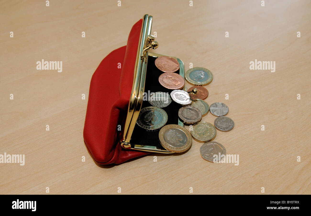 British coins and a red leather purse Stock Photo