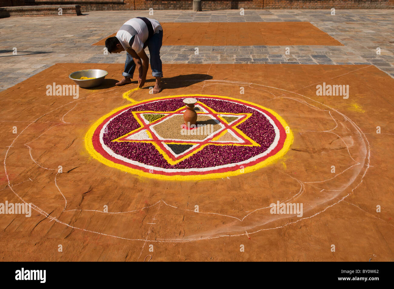 creating a mandala for the Tihar Festival in Kathmandu, Nepal Stock Photo
