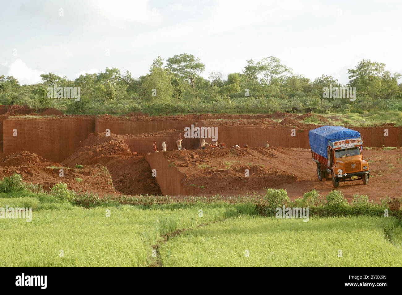 Laterite mining near Devrukh, Konkan, Maharashtra, INDIA. HORIZONTAL IMAGE. Stock Photo