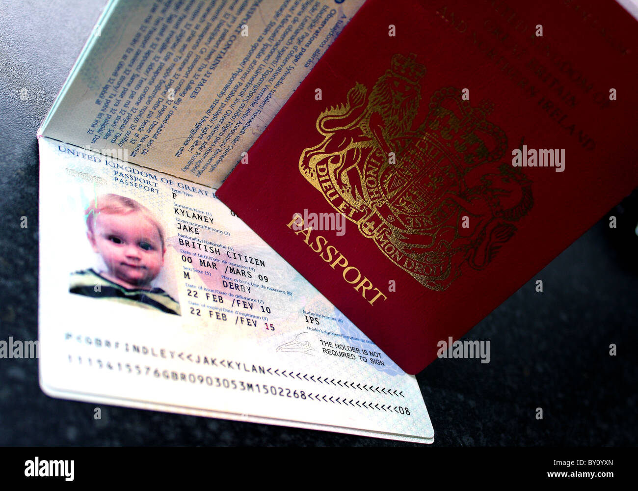 A UK British childs toddlers new passport chipped and ready to use for travel and proof of
