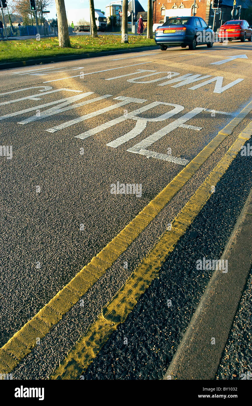 Road marking on coloured asphalt United Kingdom Stock Photo - Alamy