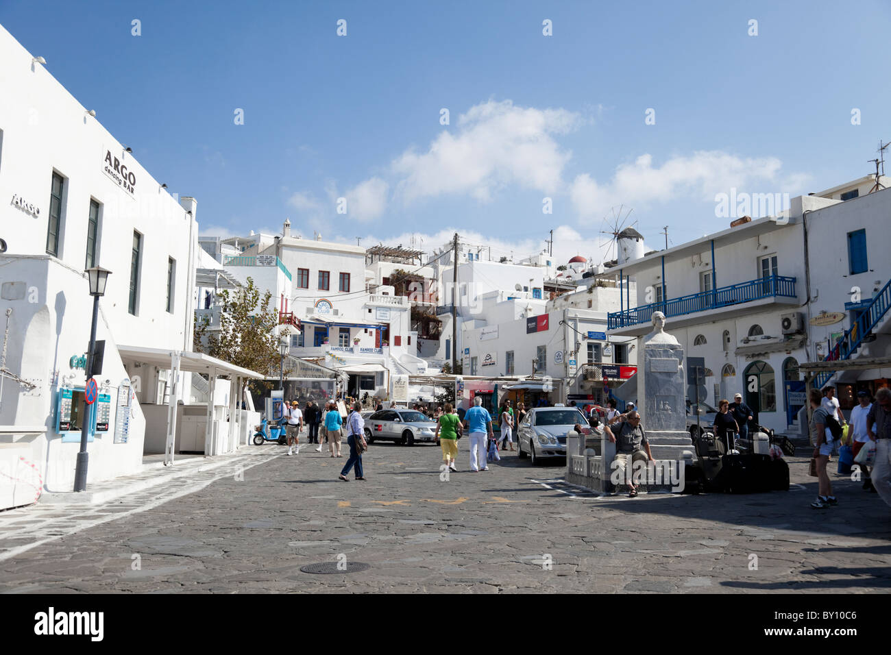 Mykonos town square with bustling shoppers. Stock Photo