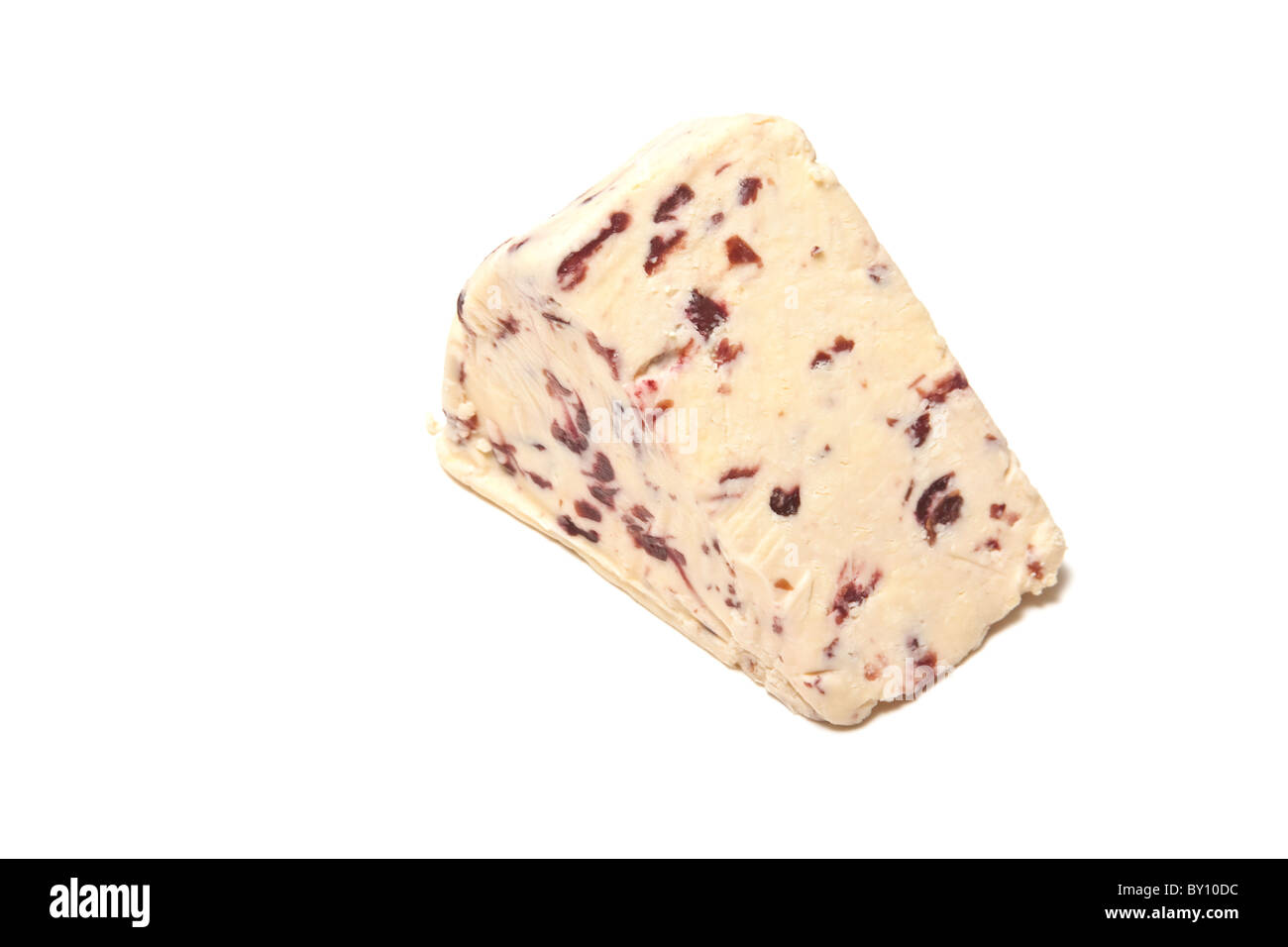 Wedge of Wensleydale and cranberry cheese isolated on a white studio background. Stock Photo