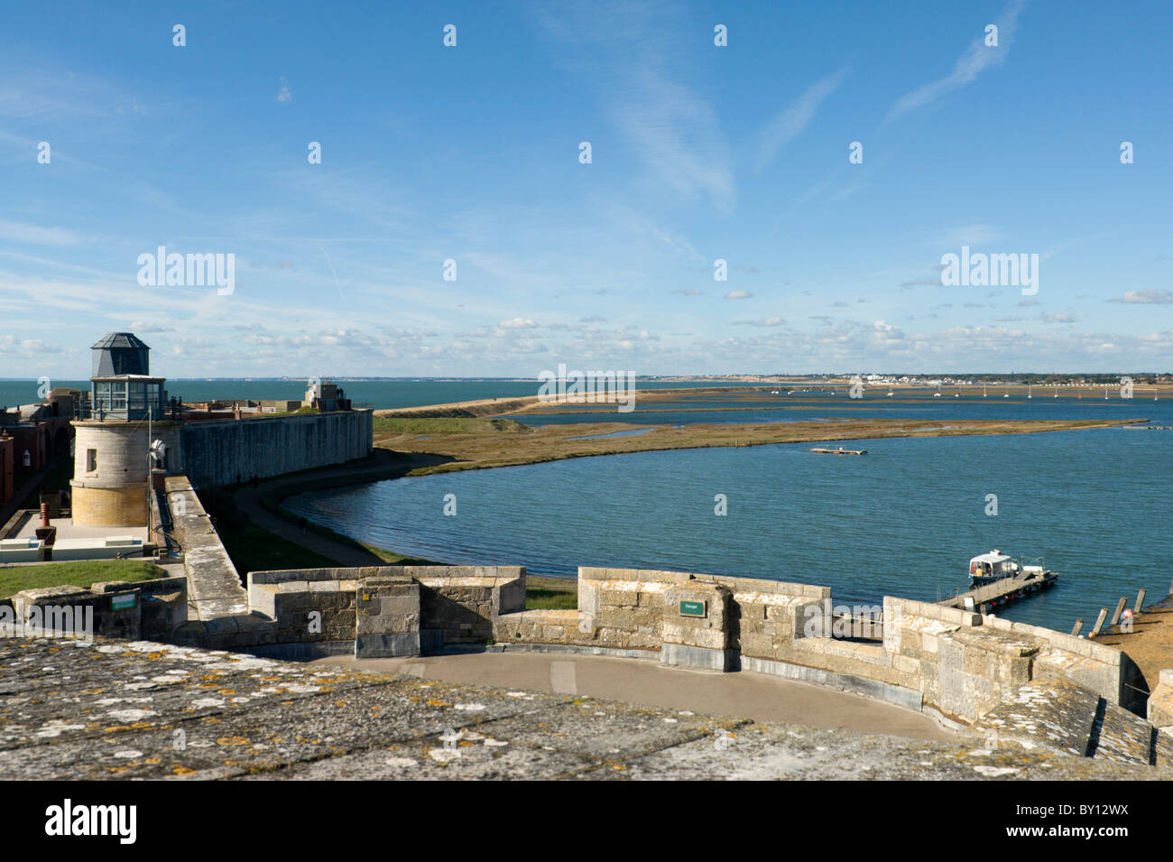 View across the battlements at Hurst Castle towards the shingle spit and Milford on Sea Hampshire Stock Photo