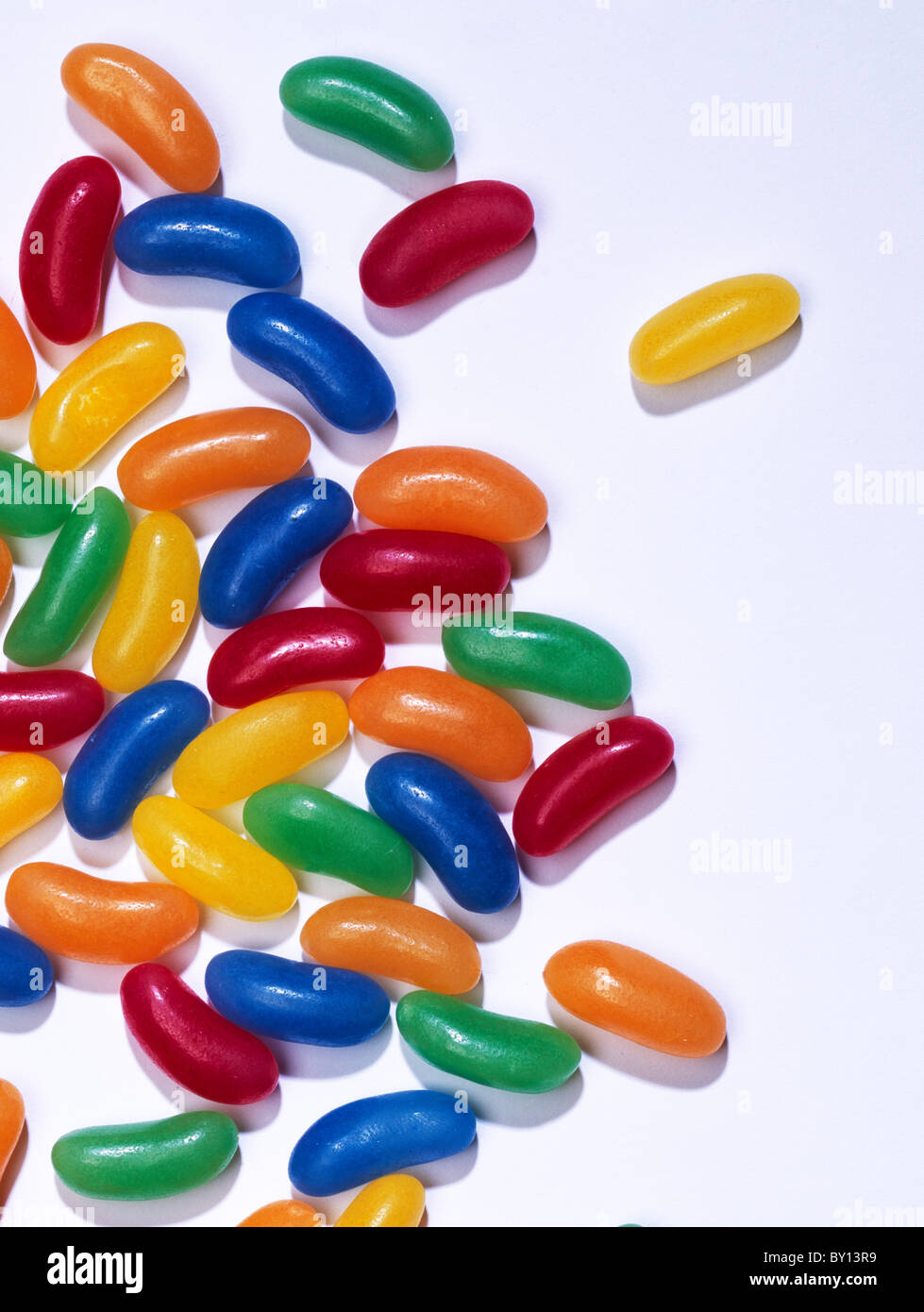 multi coloured colored Jelly beans on white background Stock Photo