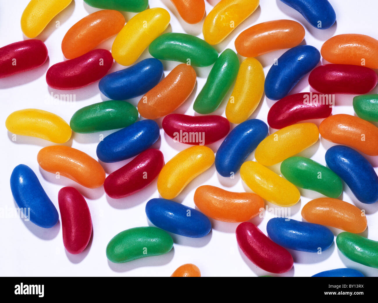 multi coloured colored Jelly beans on white background Stock Photo